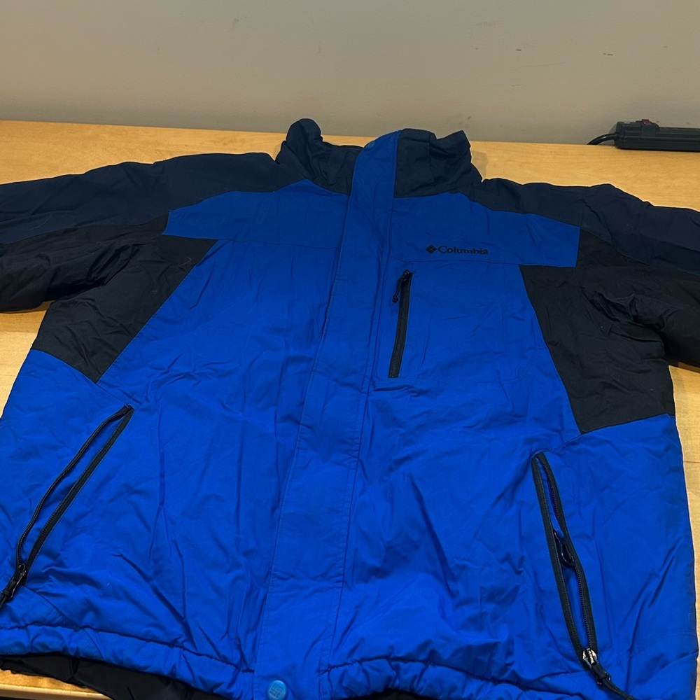 Blue heavy Columbia winter jacket. minor spots!!